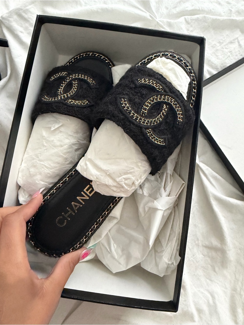 CHANEL Black Faux-Fur Slide Mules with Gold Chain CC
